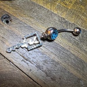 Playboy belly ring